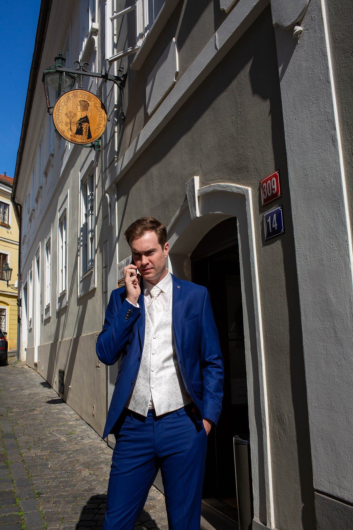 A phone call from the bride to make sure he is not around as she is about to leave the hotel.