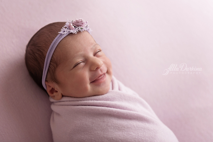 Adorable smiling baby girl photo taken by talented photographer in Sydney.
