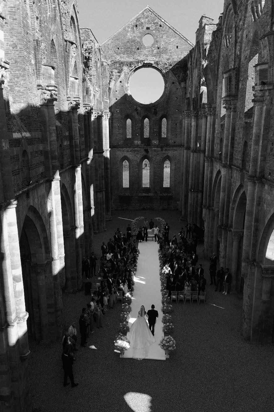 Ginevra and Avi — Abbazia di San Galgano, Tuscany. Destination Wedding Photographers and content creators based in Spain