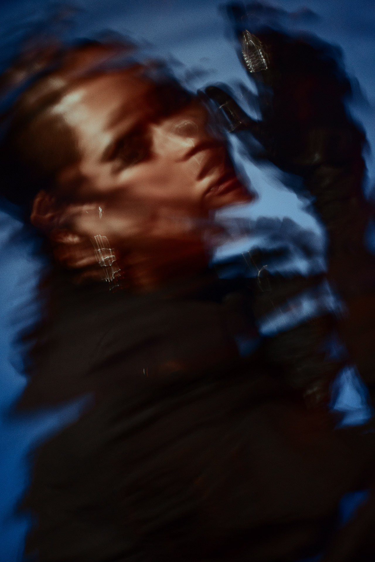 Motion blur fashion portrait, artistic editorial photography