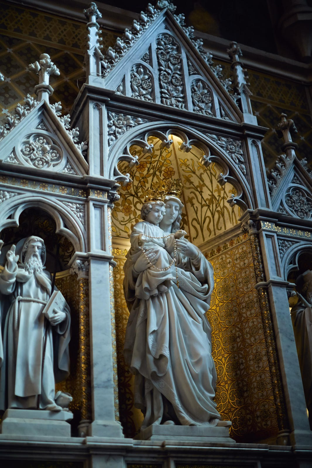 Historic saint statues adorning St Martin's Church walls Bled.