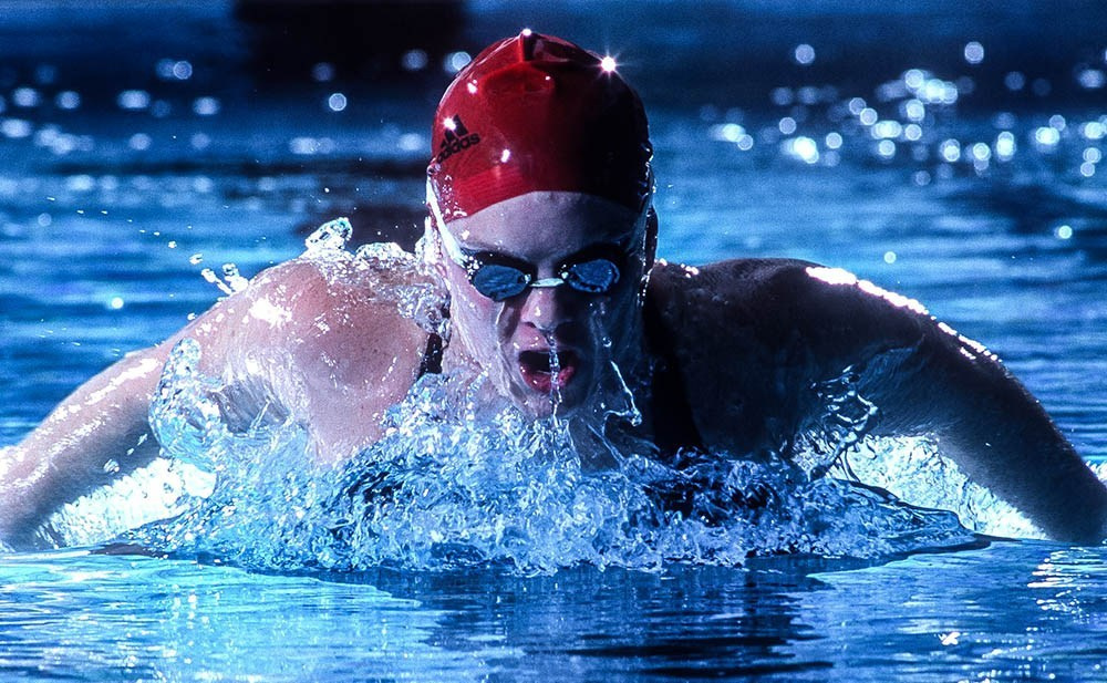UofL swimmer in a dramatic on-location portrait.