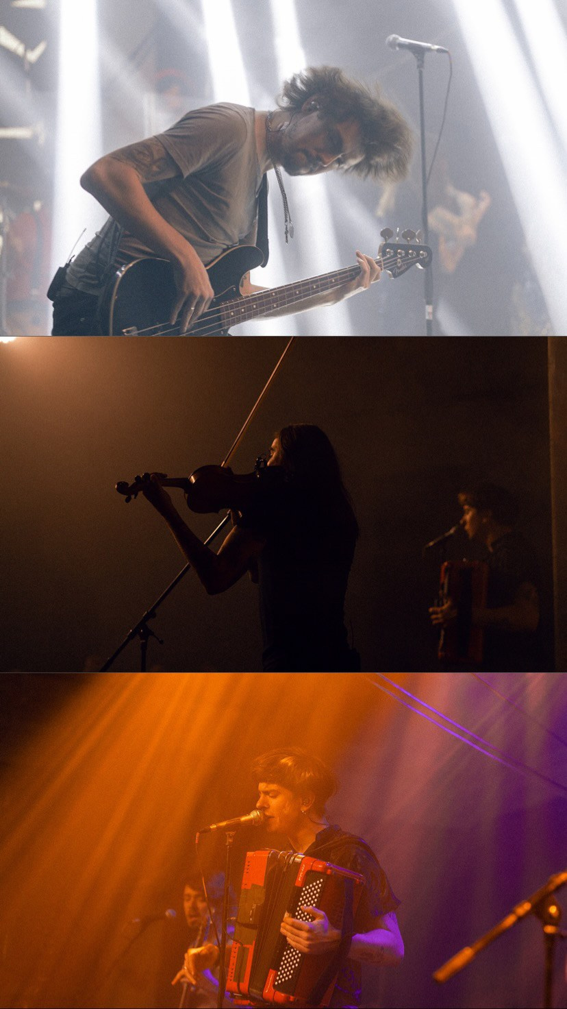 Bright neon lights and the lighting of the outdoor stage at a nighttime concert⁠