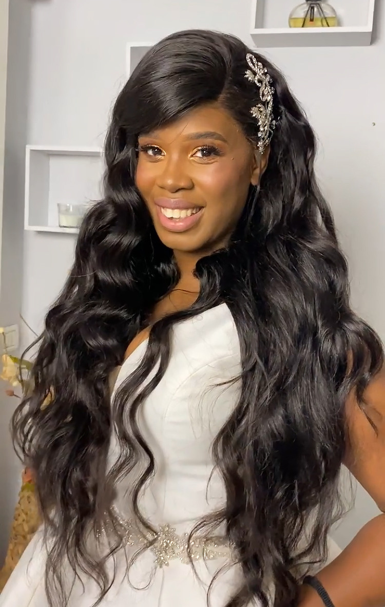 Hollywood waves styled wig on a black skinned bride