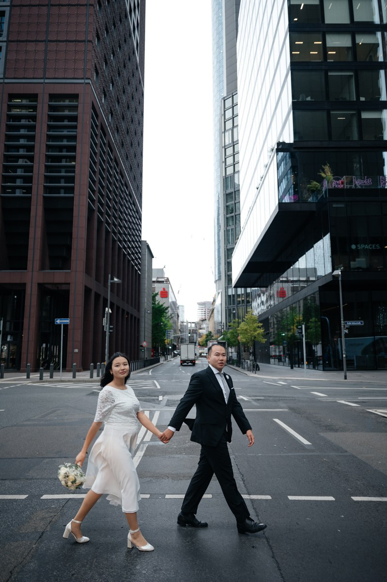 Bride and Groom crossing a street in Frankfurt