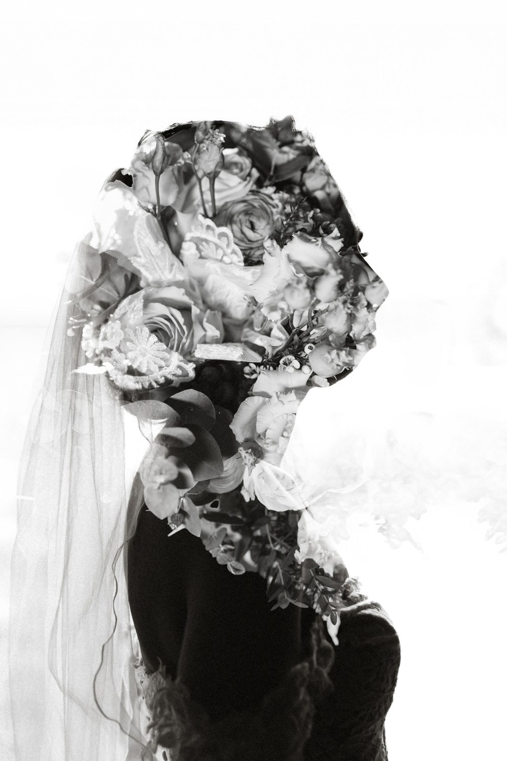 bride creative portrait black white with flowers
