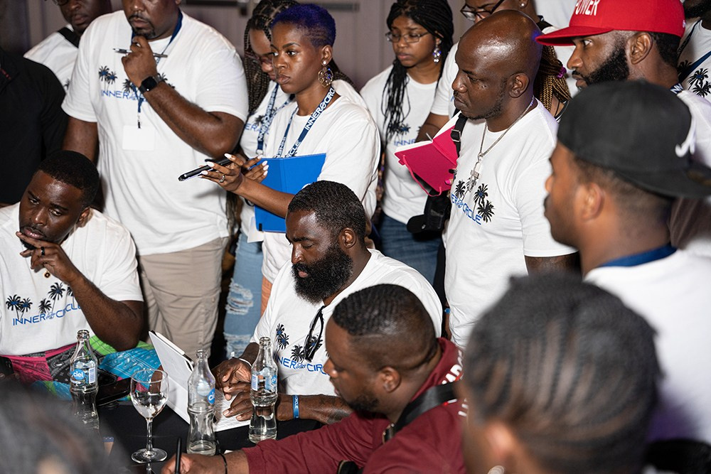 Small group reviewing key takeaways from corporate session together.