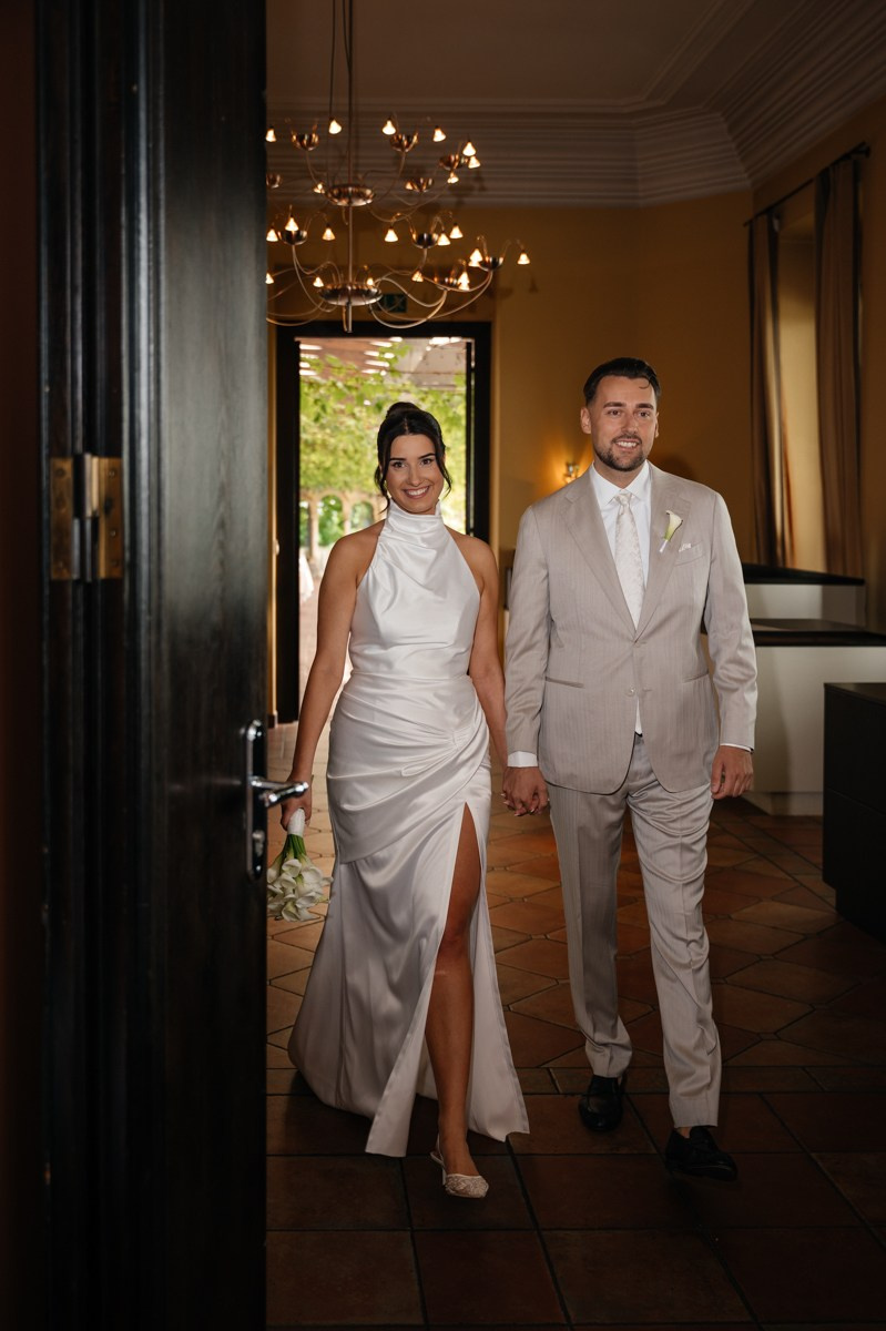 bride and groom coming into location
