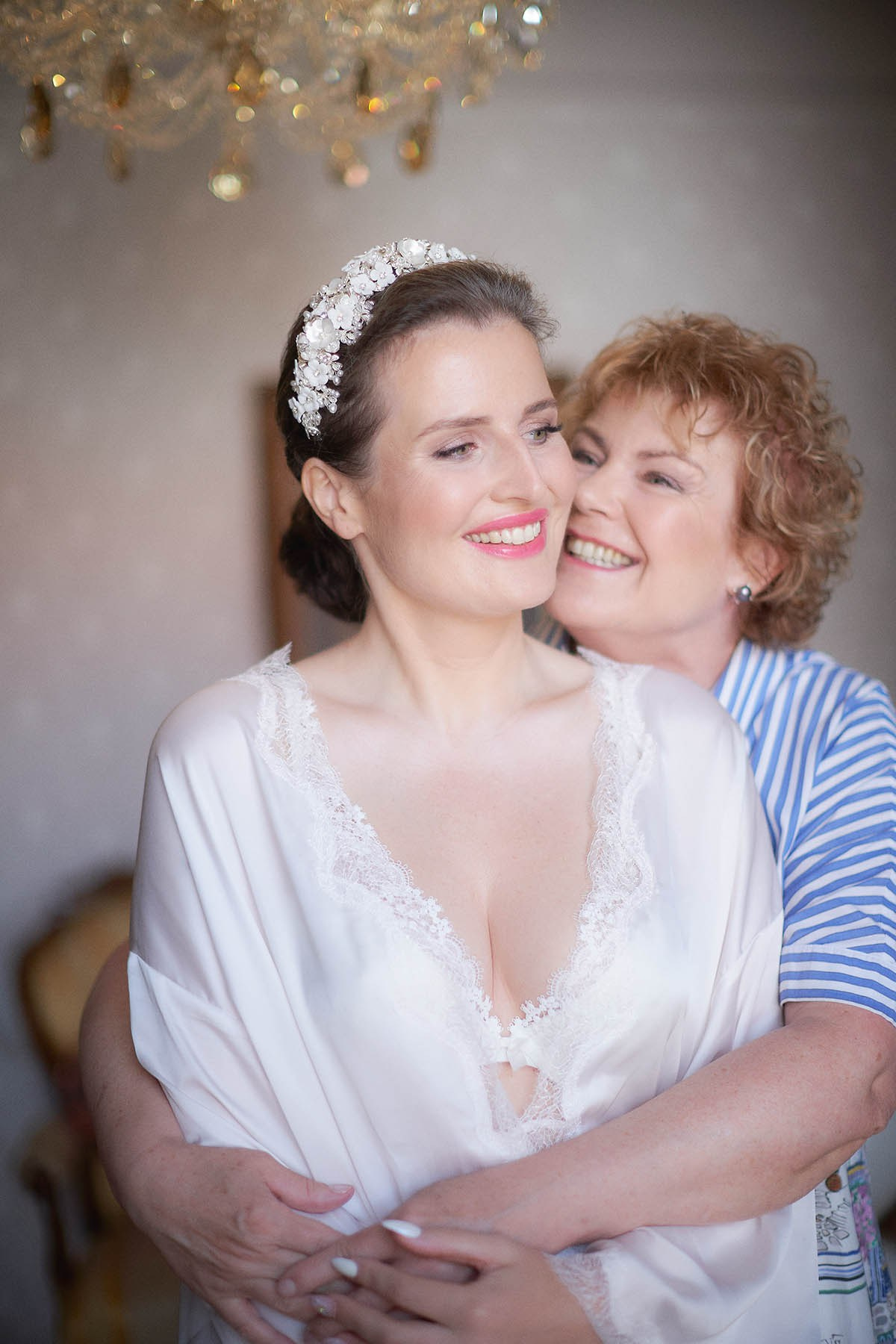 Adéla gets a loving hug from her mother.