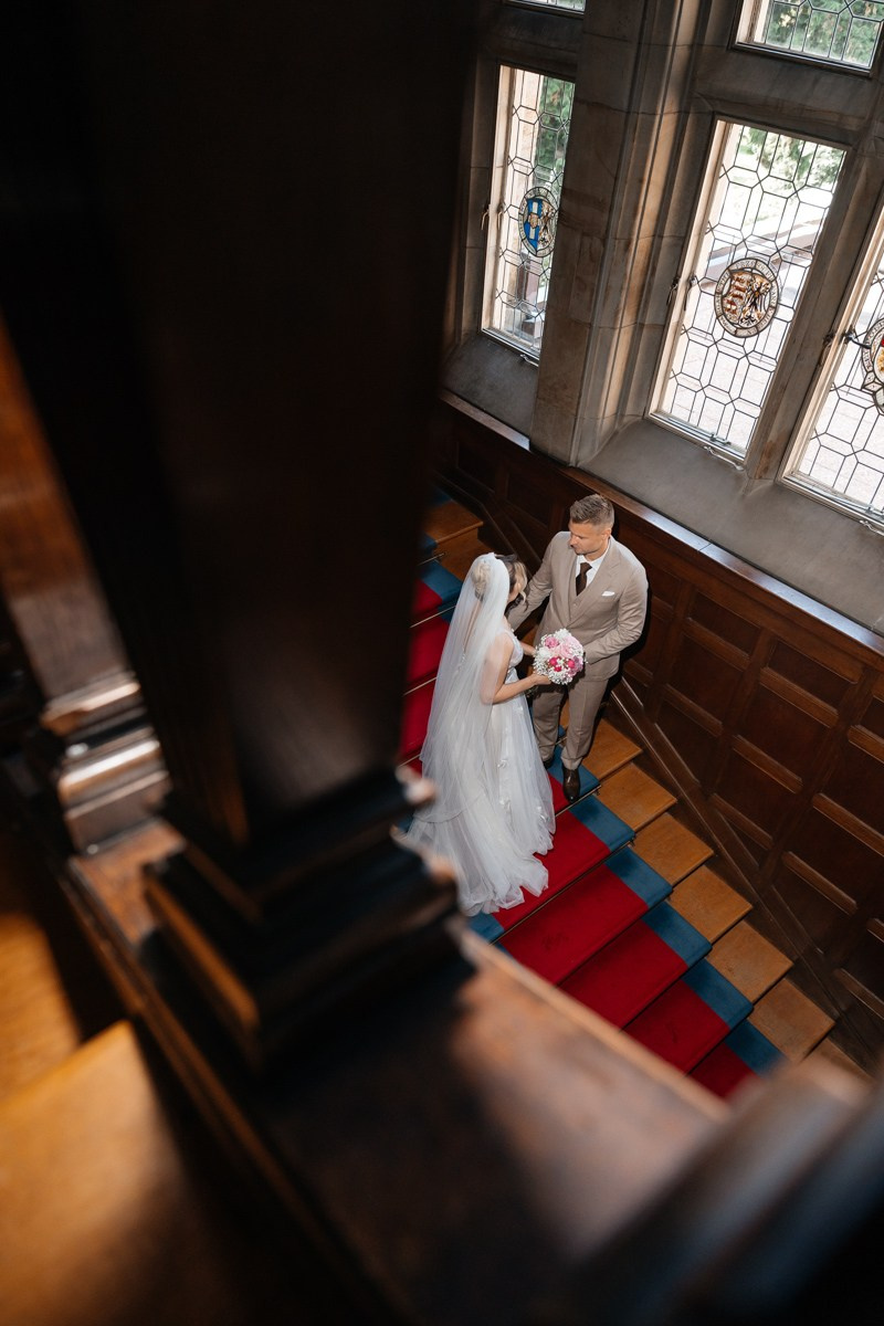 bride and groom in kronberg on stairs