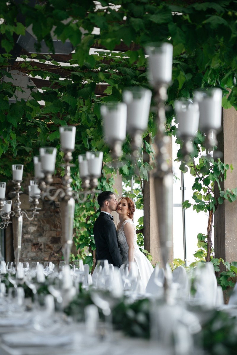 Bride and groom at restaurant in burg schwarzenstein