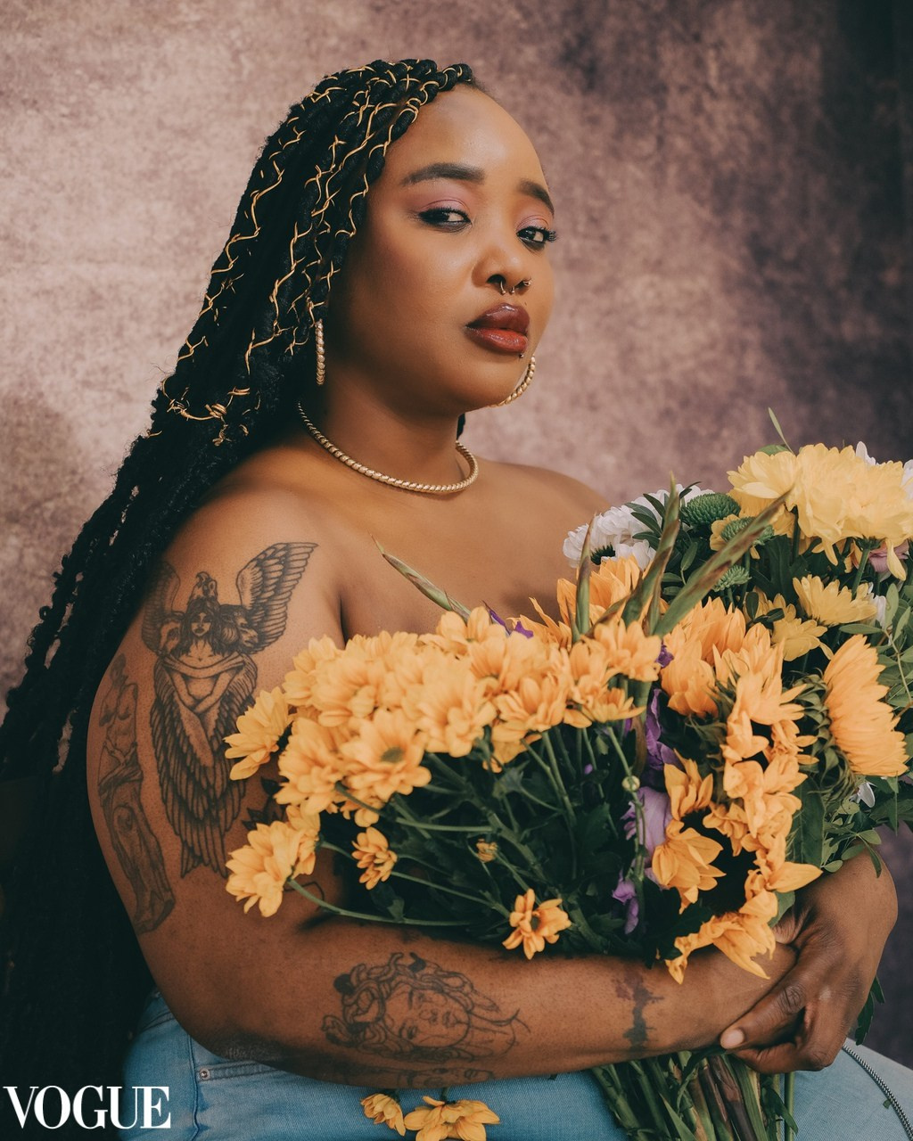 Woman adorned with golden blooms, editorial portrait from an Artistic Discovery Session in Solihull.