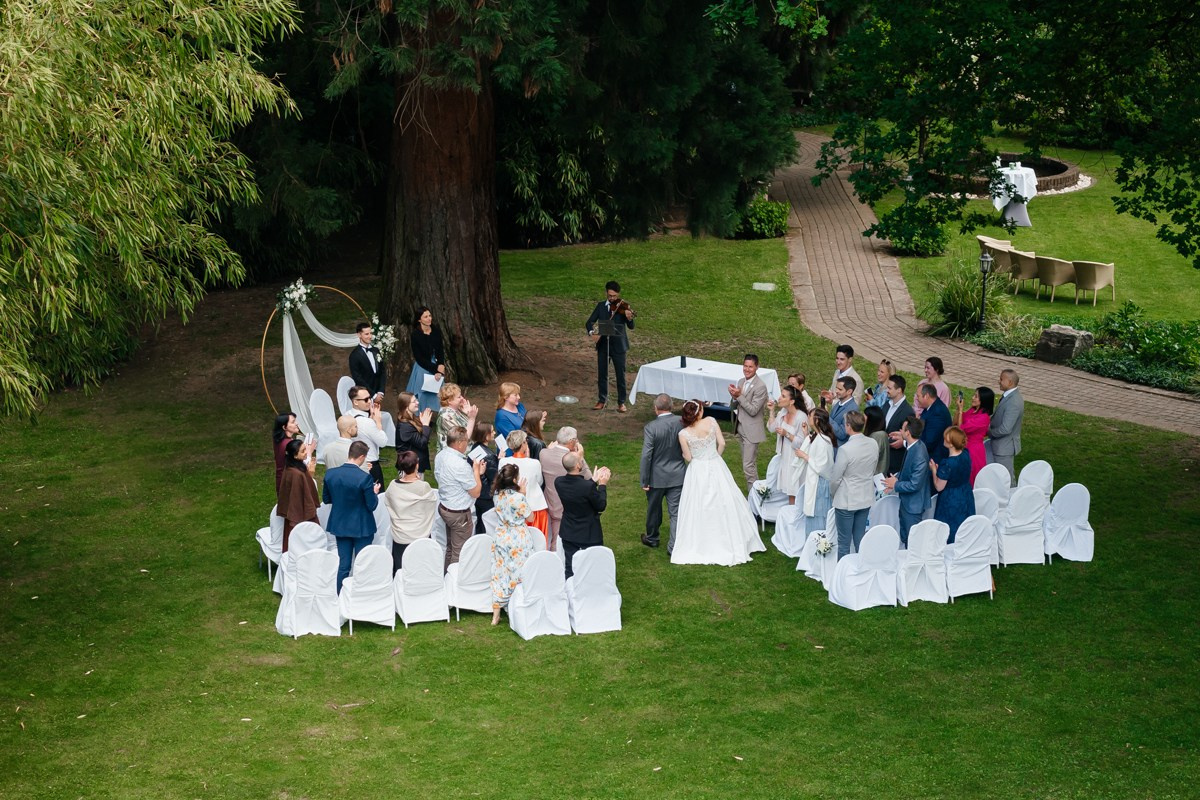 drone footage of ceremony in burg schwarzenstein