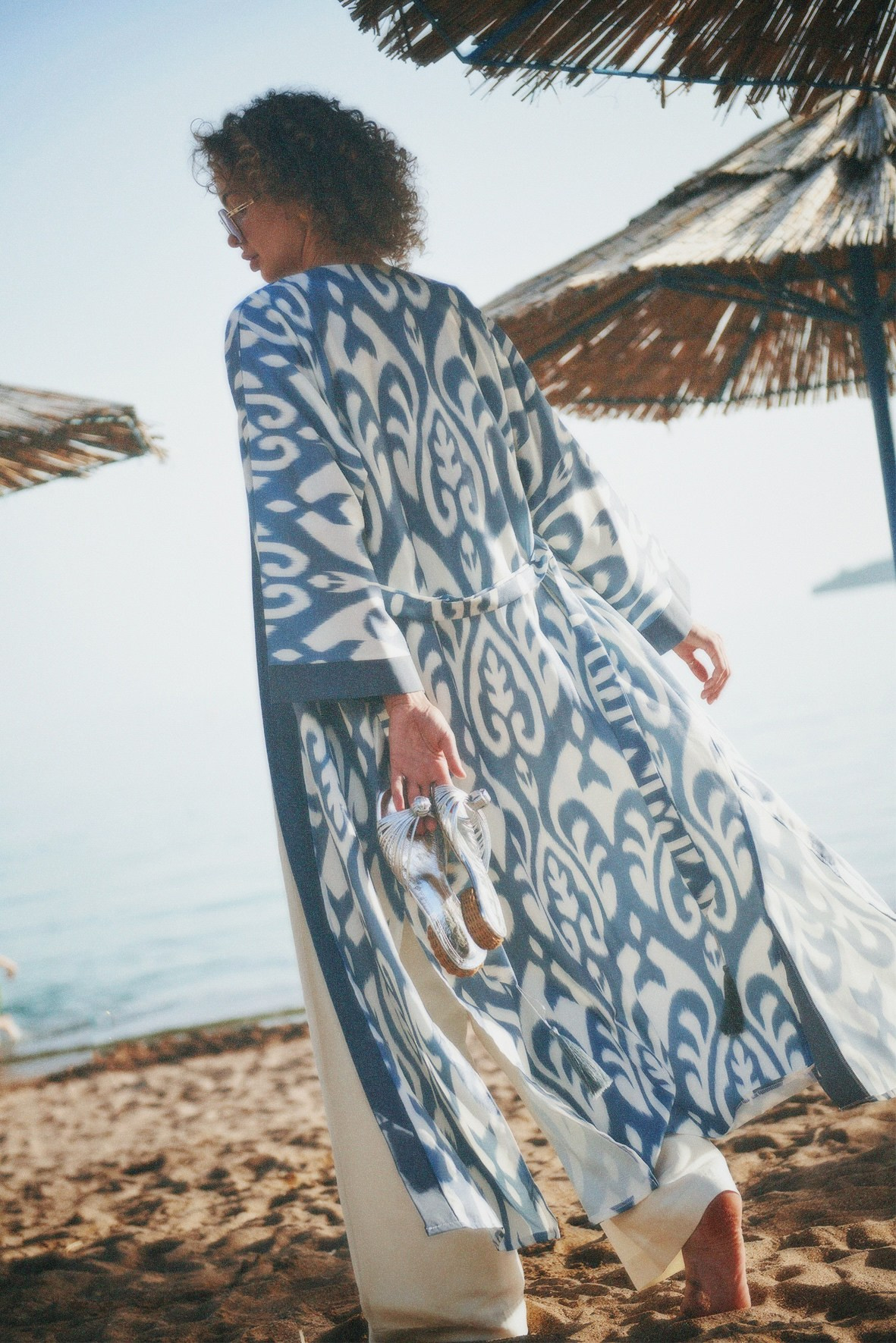 Editorial campaign for a beachwear brand, captured on the seashore in natural light