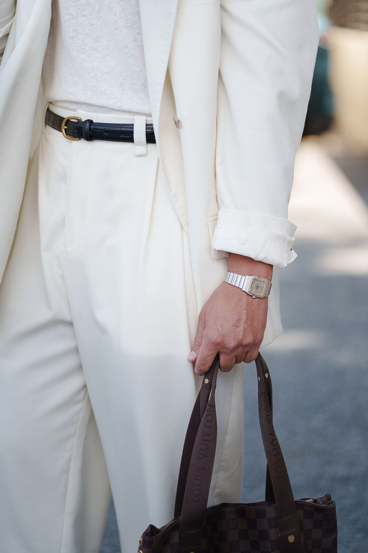 Pitti Uomo 110 tailoring detail, white suit, watch and leather tote bag in Florence