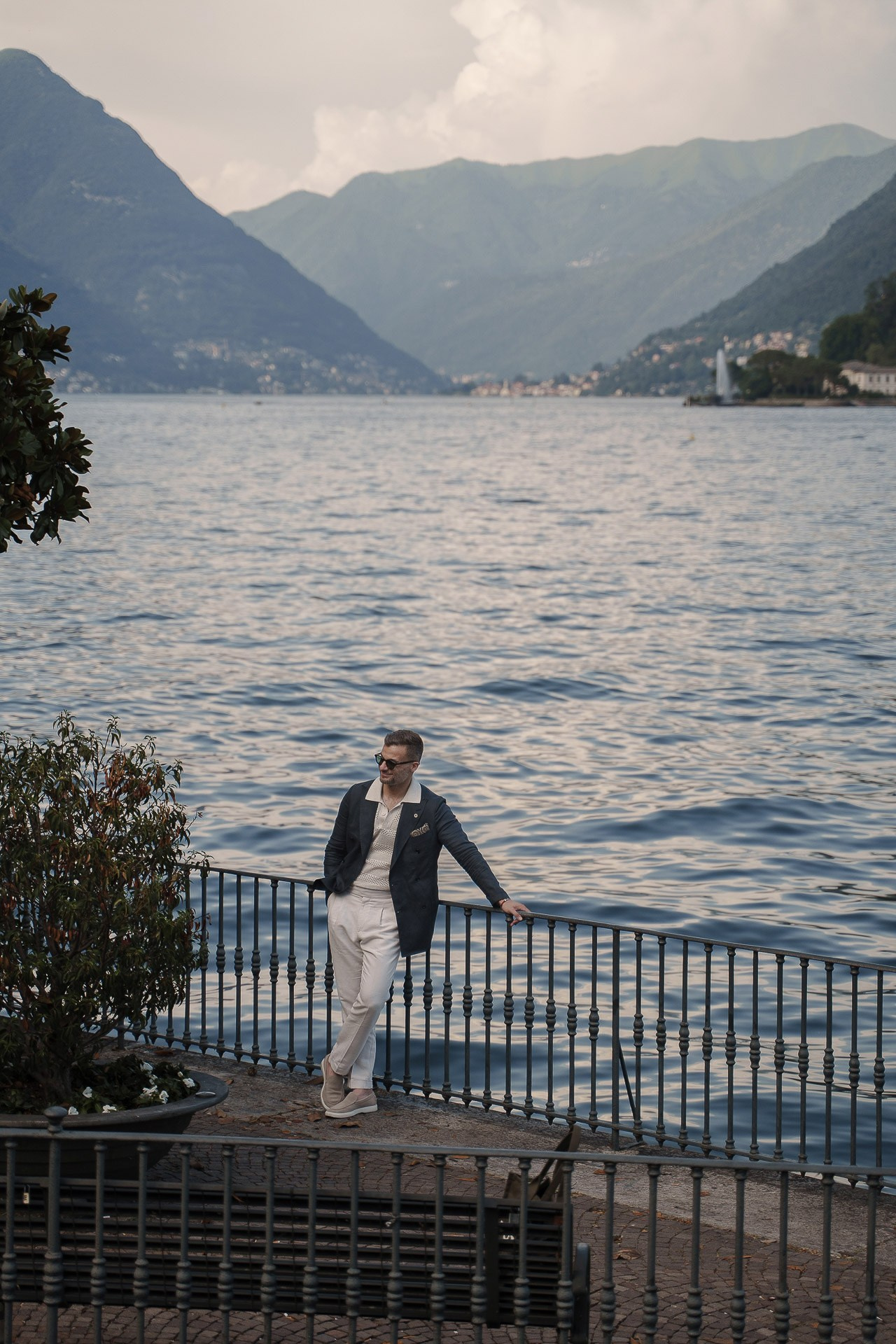 Portrait of a man by the waterfront at Lake Como