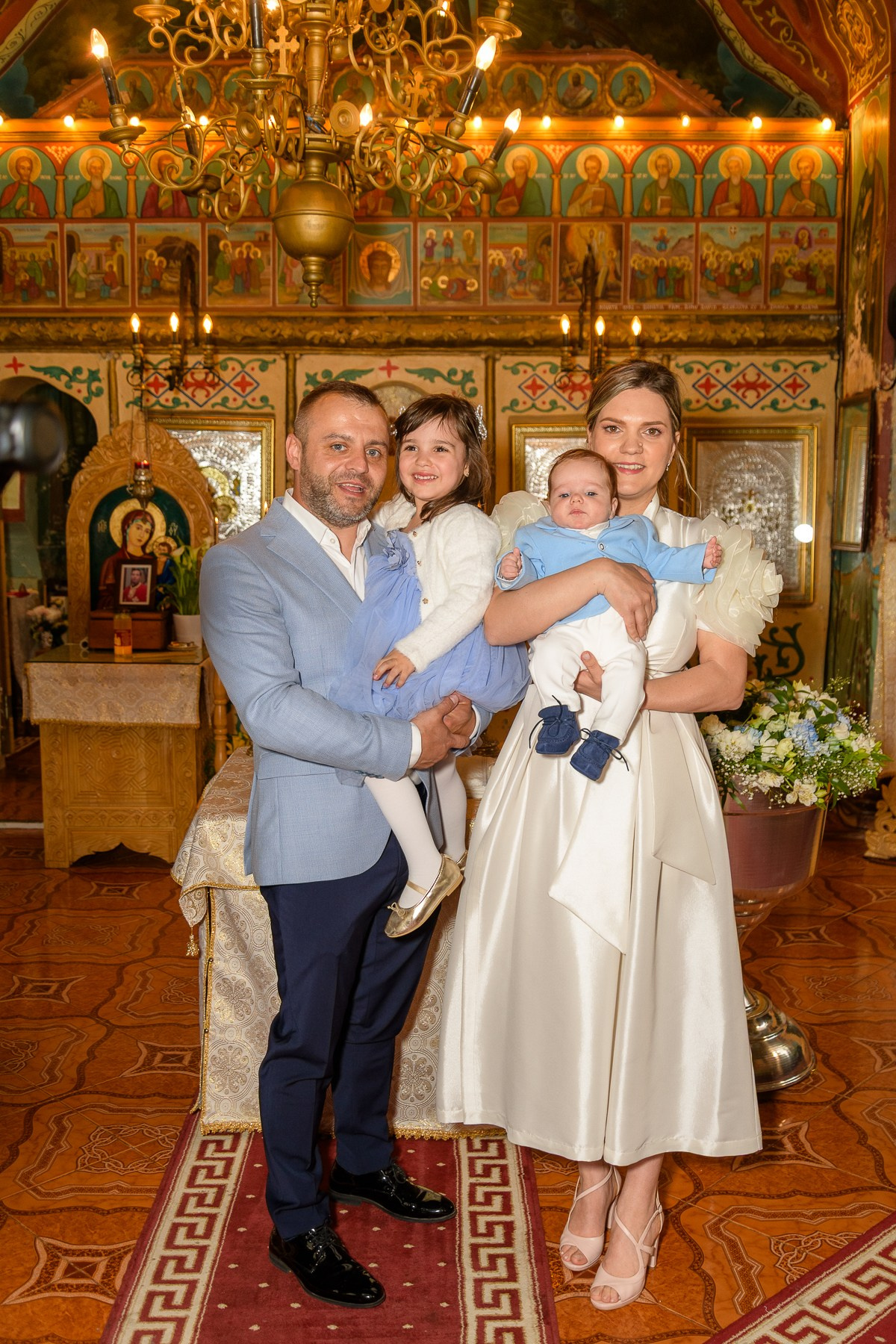 The Christening of Alexandru. Hand for photos