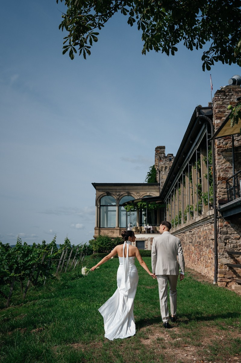 bride and groom at castle