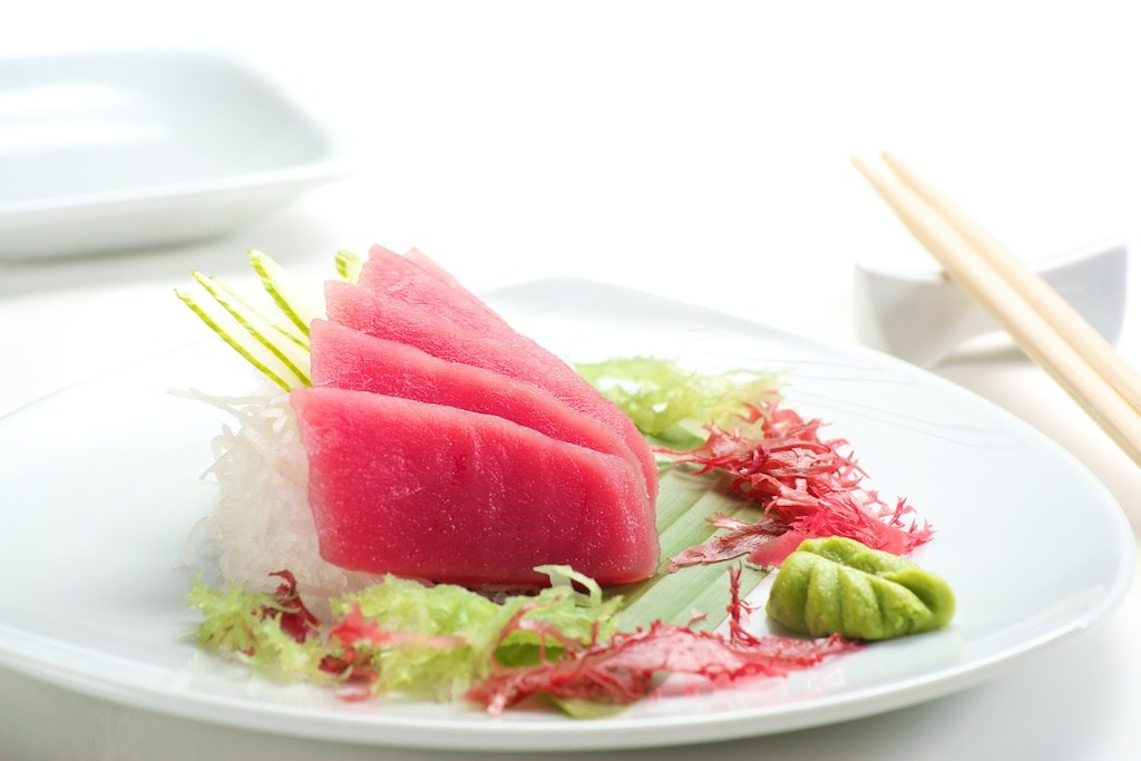 Sashimi on white plate - photographer Andrey Dunin