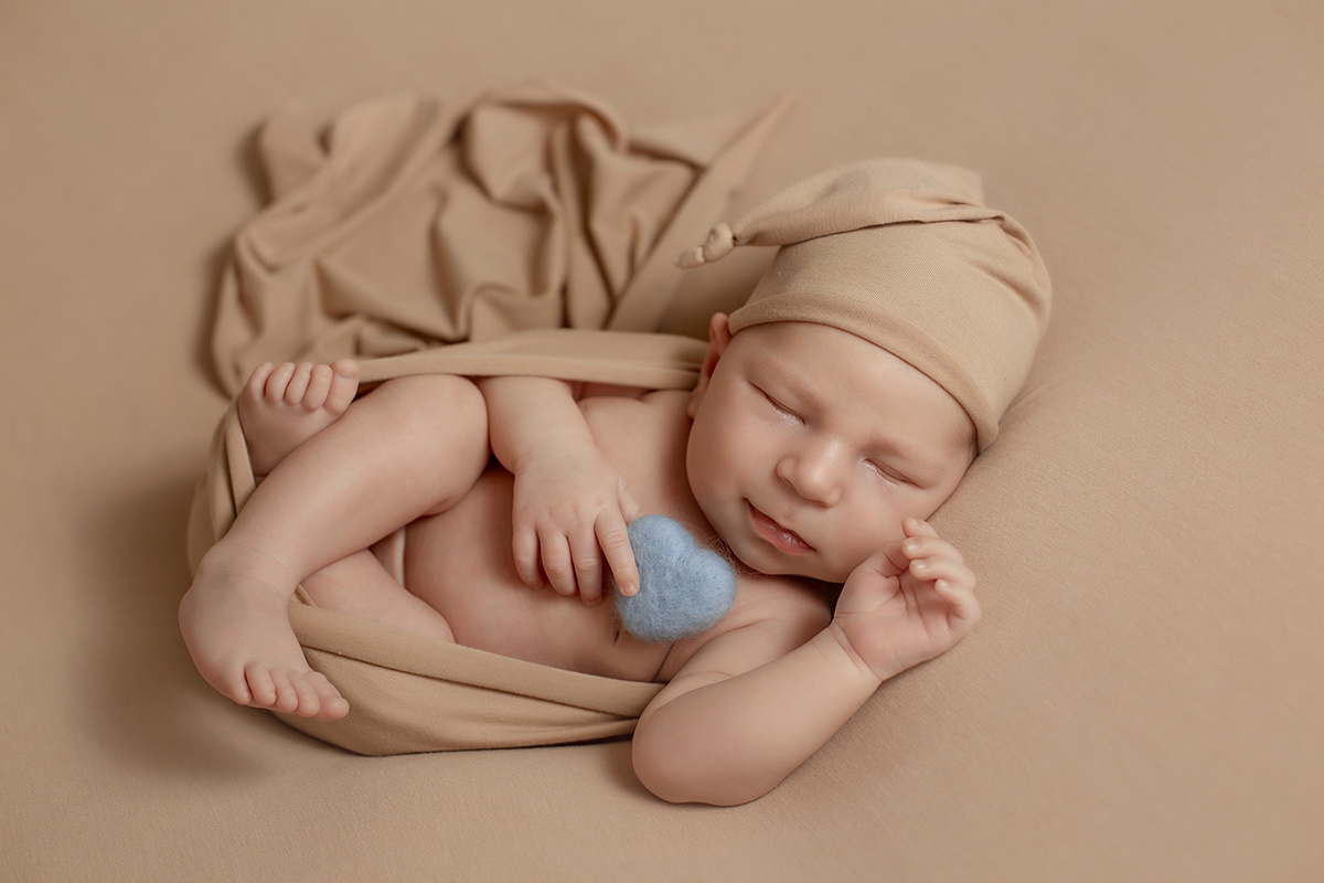 צילומי ניובורן ליהונתן המתוק. נטליה רוזמן צלמת הריון ניובורן ילדים ובוק בת מצווה