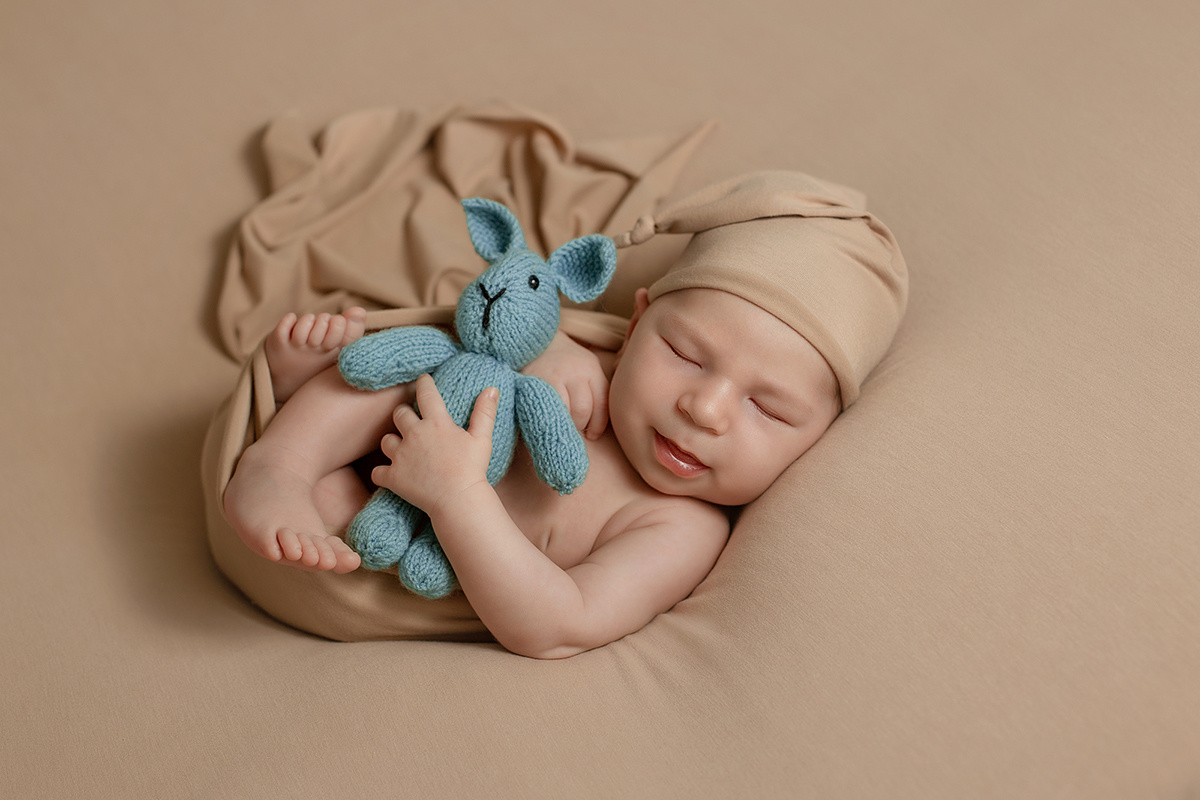 צילומי ניובורן ליהונתן המתוק. נטליה רוזמן צלמת הריון ניובורן ילדים ובוק בת מצווה