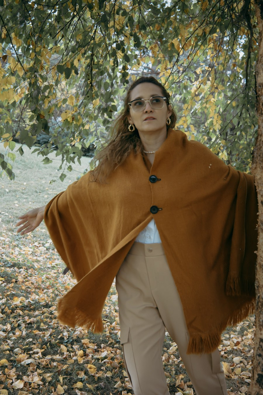 Woman in warm autumn outfit during a Calgary fall photography session