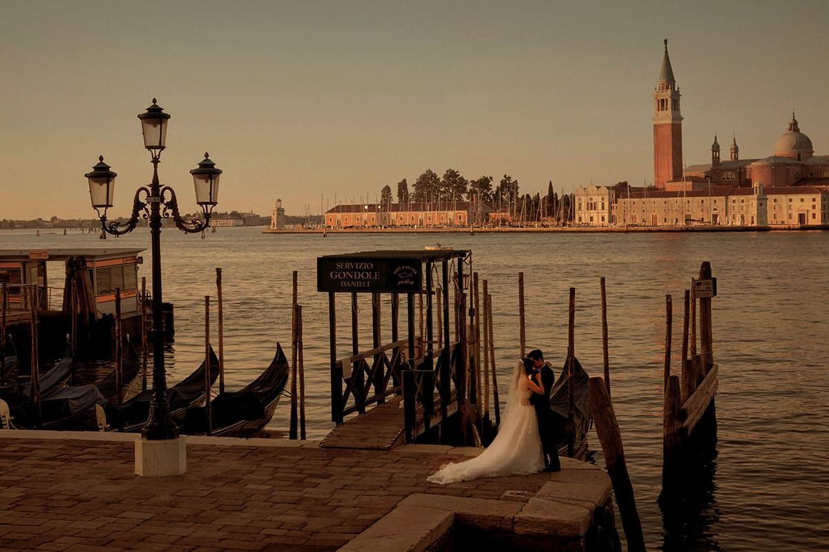Daisy and Luis are enjoying the historic scenery and early morning atmosphere of Venice.