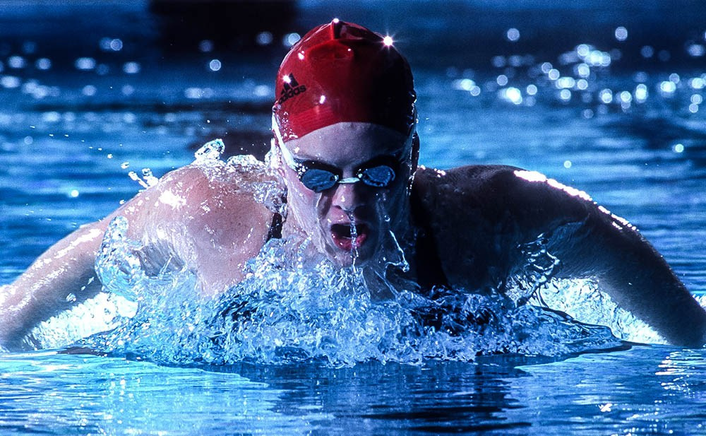 UofL swimmer in a dramatic on-location portrait.