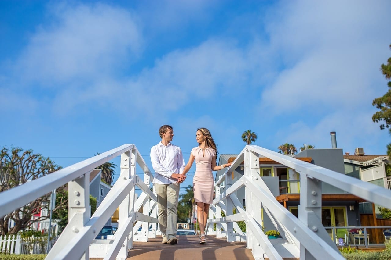 Embracing couple on a bridge, part of a Venice Canals photography session