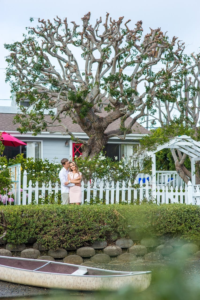 Professional photoshoot at the Venice Canals LA showcasing a loving couple