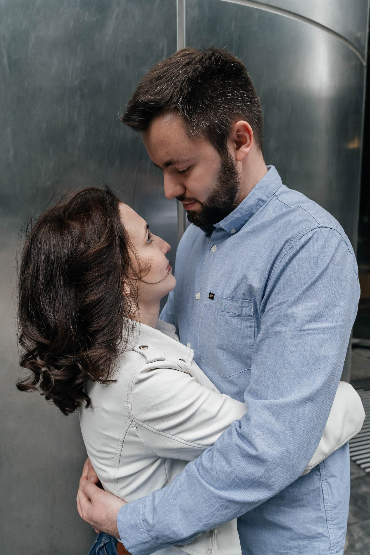 Urban Toronto engagement photography Ksenia and Artem walking downtown.