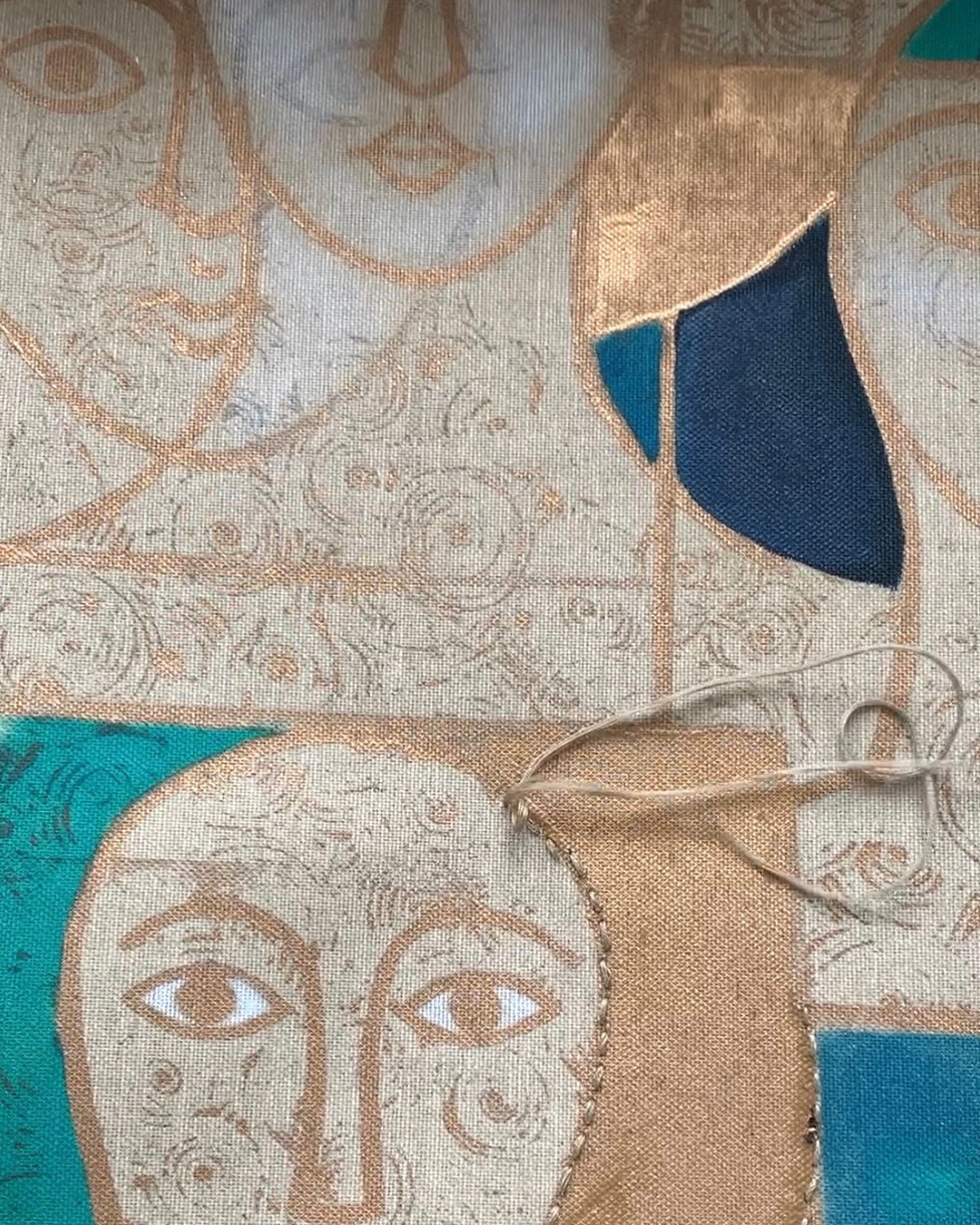 In Santi Volti, Nadia Kuprina explores the theme of the icon through seriality and material stratification. The work originates from the repetition of three original linocuts, hand-printed in gold, and is subsequently transformed through hand stitching, oil painting, and applications of gold leaf.Its exhibition history — two abbey settings and one winery — highlights the versatility of the work, capable of engaging with spiritual, architectural, and unconventional exhibition spaces. The publication in a catalogue reinforces its curatorial relevance and the solidity of the artist’s trajectory.