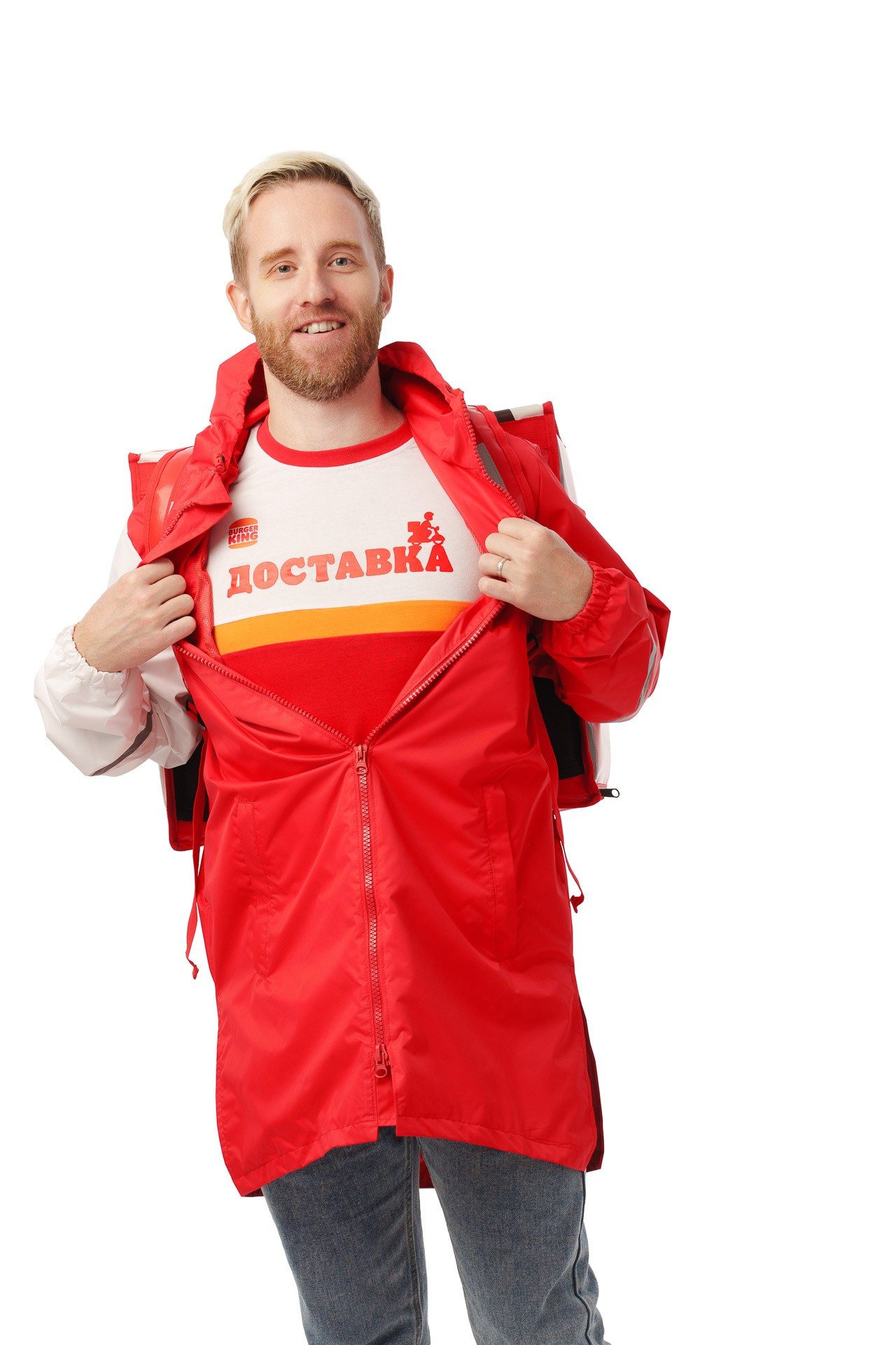Burger King delivery courier opening jacket with branded uniform underneath