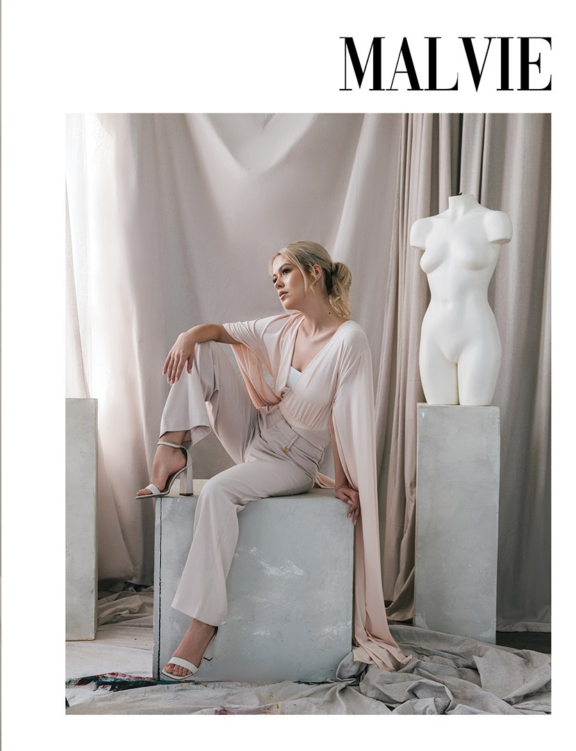 Published fashion editorial featuring expert skin retouching