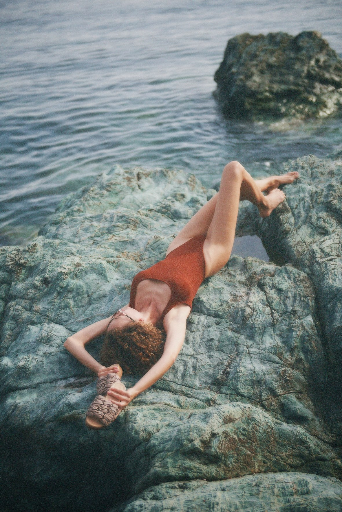 Editorial campaign for a beachwear brand, captured on the seashore in natural light