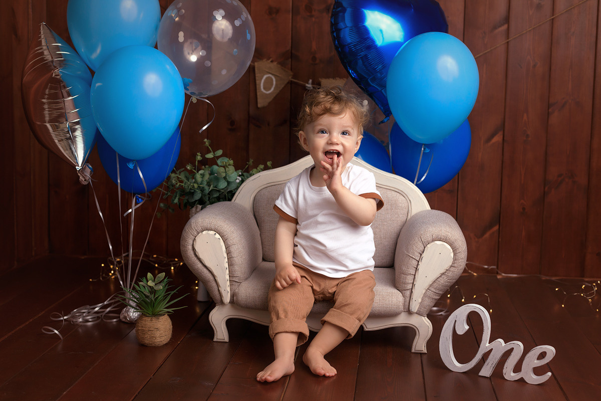 עוגה ראשונה וצילומי גיל שנה לרון. נטליה רוזמן צלמת הריון ניובורן ילדים ובוק בת מצווה