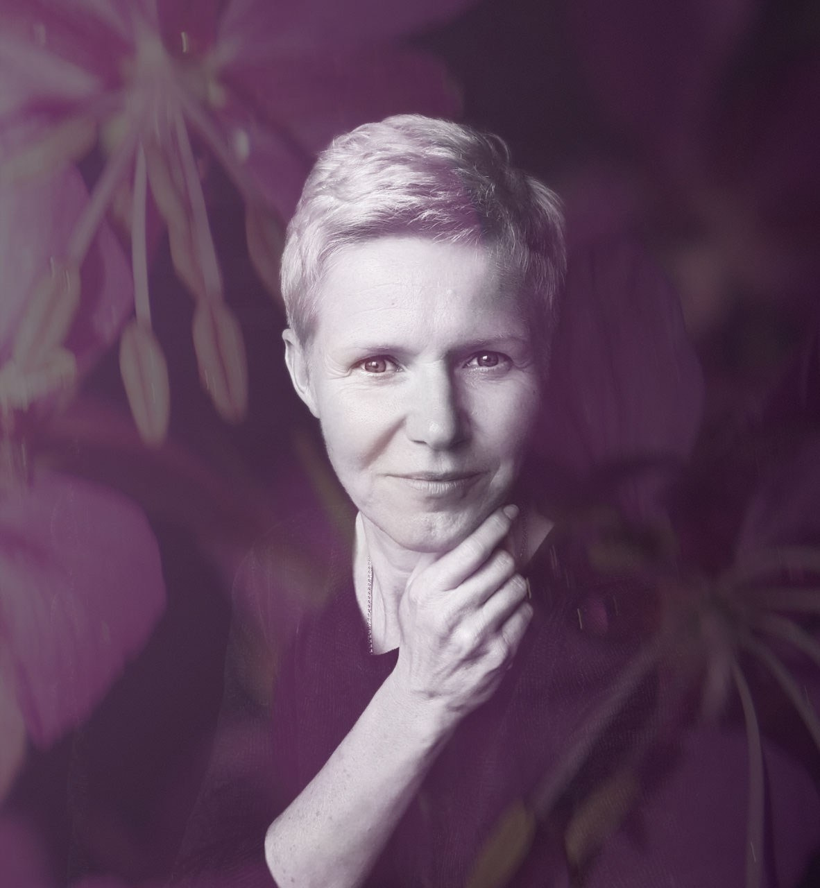 Portrait of visual artist and photographer Natalja Poplavska, UK-based, specialising in fine art photography and mixed media.