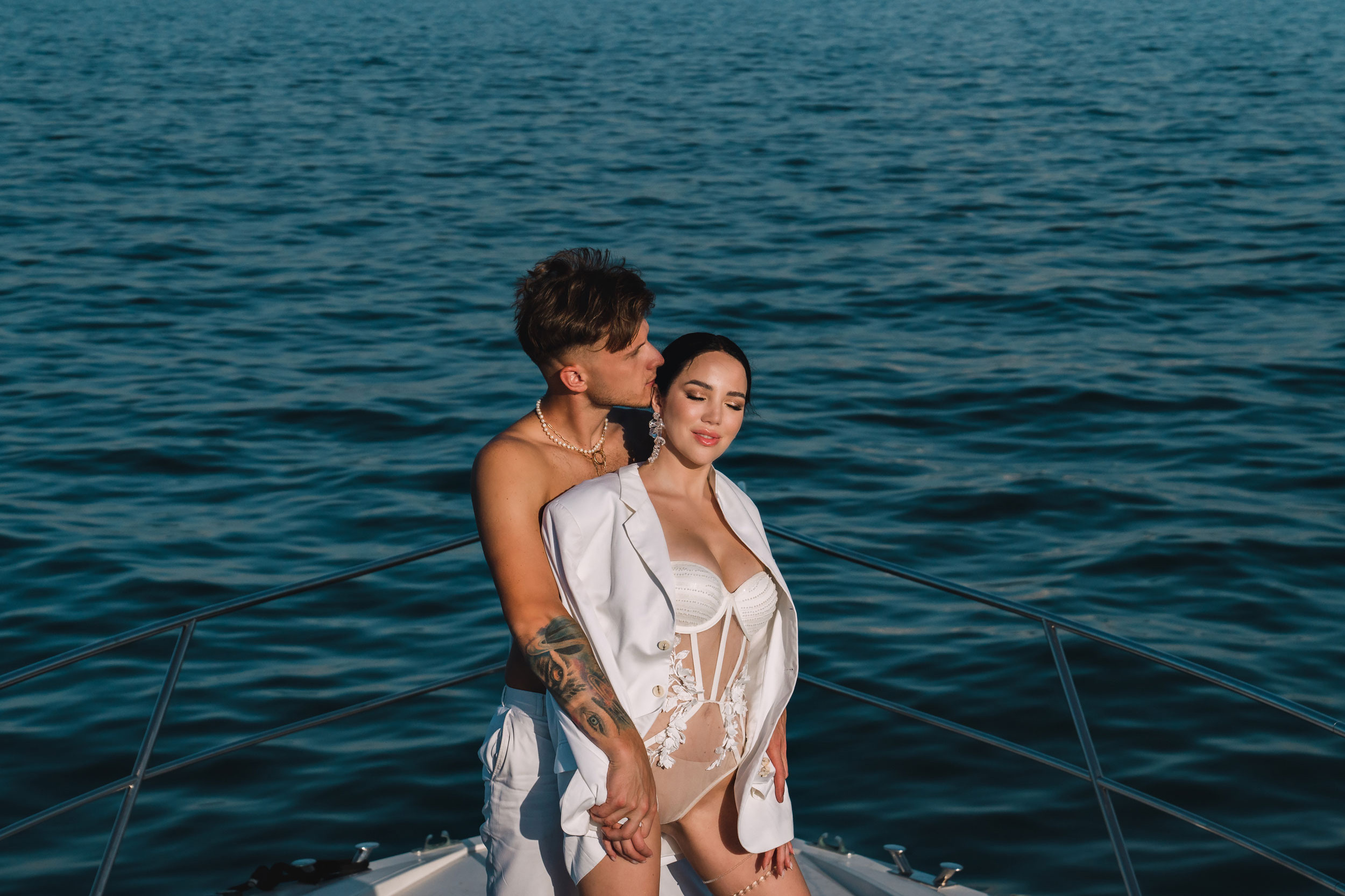 bikini dressed young woman with a sea water as a background