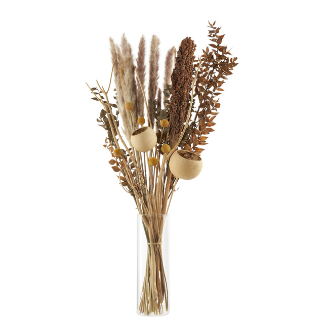 Dried flower bouquet in a glass vase on white