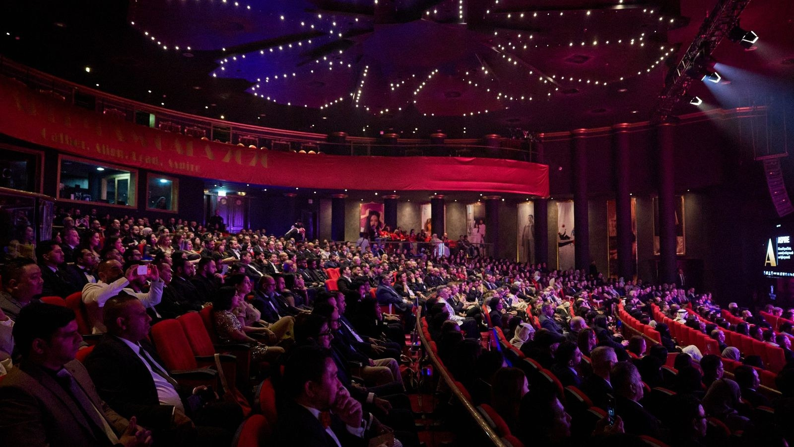 Wide conference auditorium view suitable for complete corporate event recording