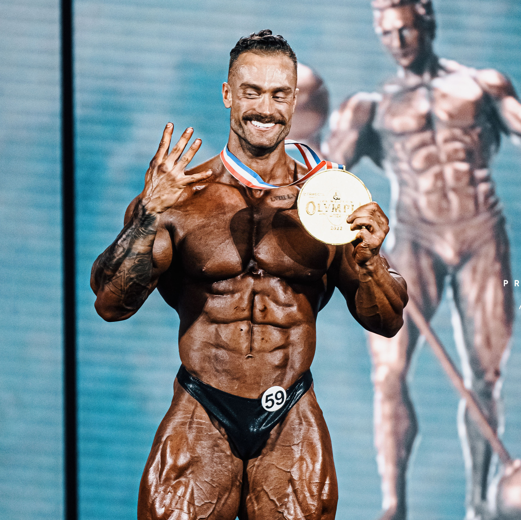 Chris Bumstead is a Canadian professional bodybuilder, born on October 2, 1994, in Ottawa, Canada. He is widely regarded as one of the top Classic Physique competitors in the world.Bumstead began training at a young age and started competing in bodybuilding competitions in 2014. He rose to fame in the Classic Physique category and has won several prestigious titles, including the Mr. Olympia Classic Physique title in 2019 and 2020.Bumstead is known for his impressive size and symmetry, and his physique is characterized by his broad shoulders, tapered waist, and well-defined abs. He has a large following on social media, where he shares his training and diet tips with his fans.In addition to his successful career as a bodybuilder, Bumstead is also a fitness model and has been featured in several major fitness publications. He is widely respected and admired in the bodybuilding community for his dedication, hard work, and achievements, and he continues to be a major force in the sport today.