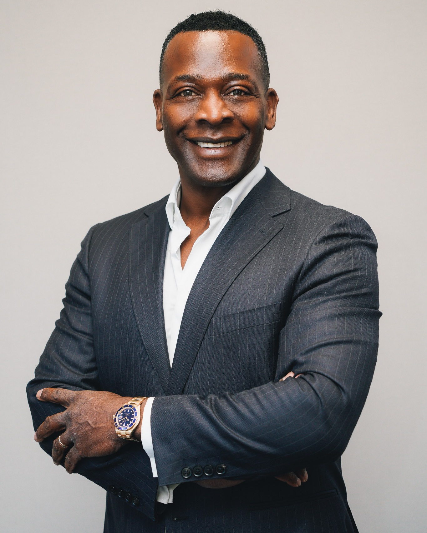 Professional brand portrait of a businessman in his Solihull office setting with natural light