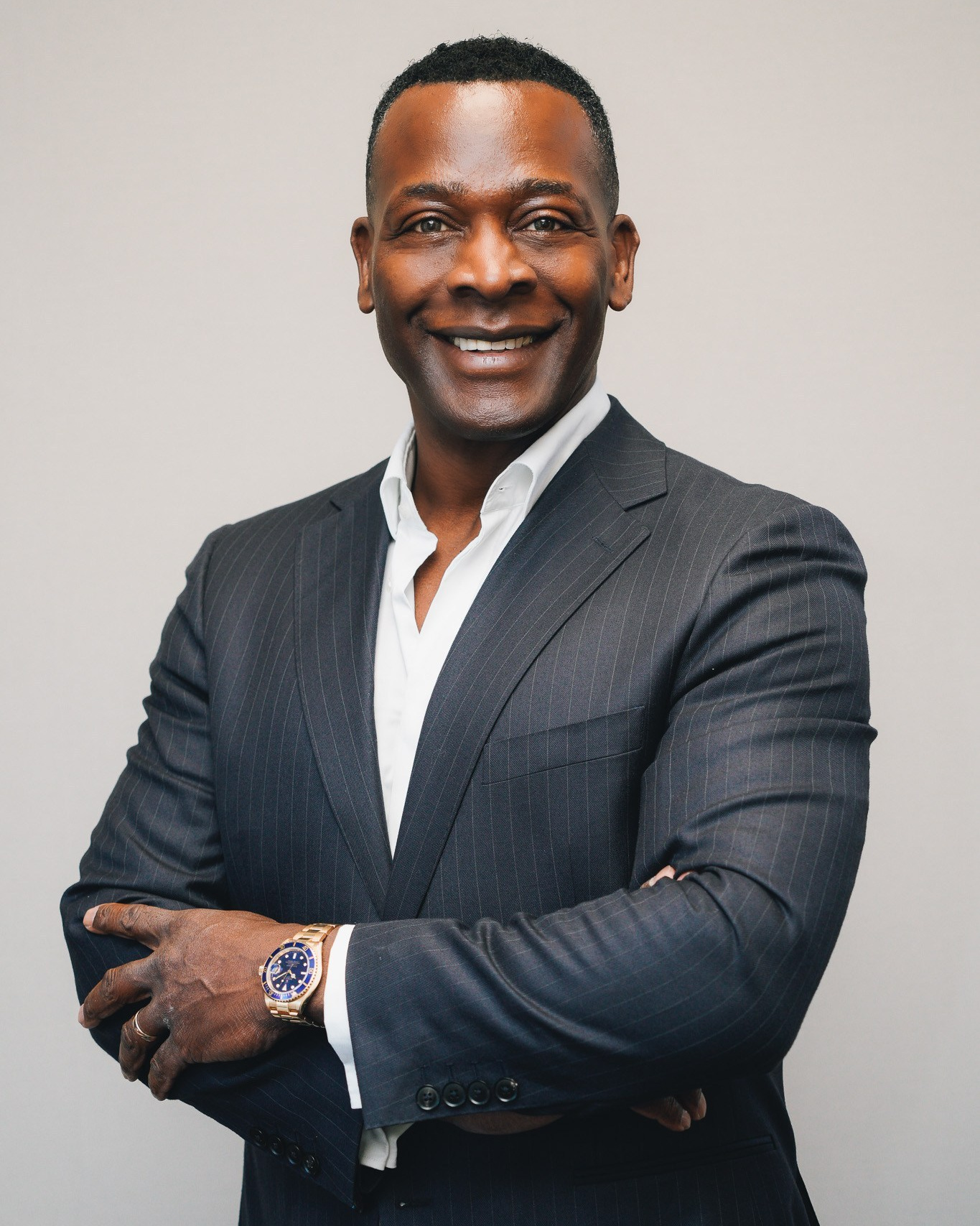 Professional brand portrait of a businessman in his Solihull office setting with natural light