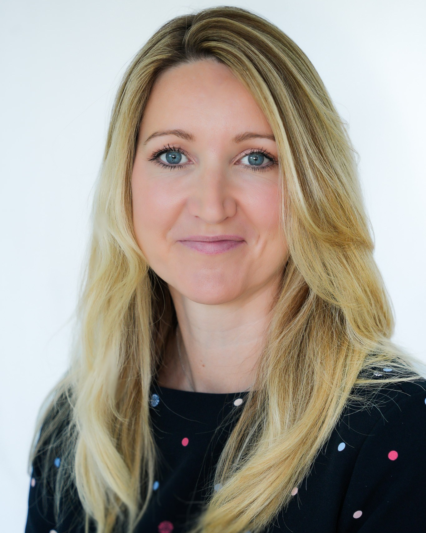 Professional headshot of a woman for business and LinkedIn profile, photographed in Solihull.