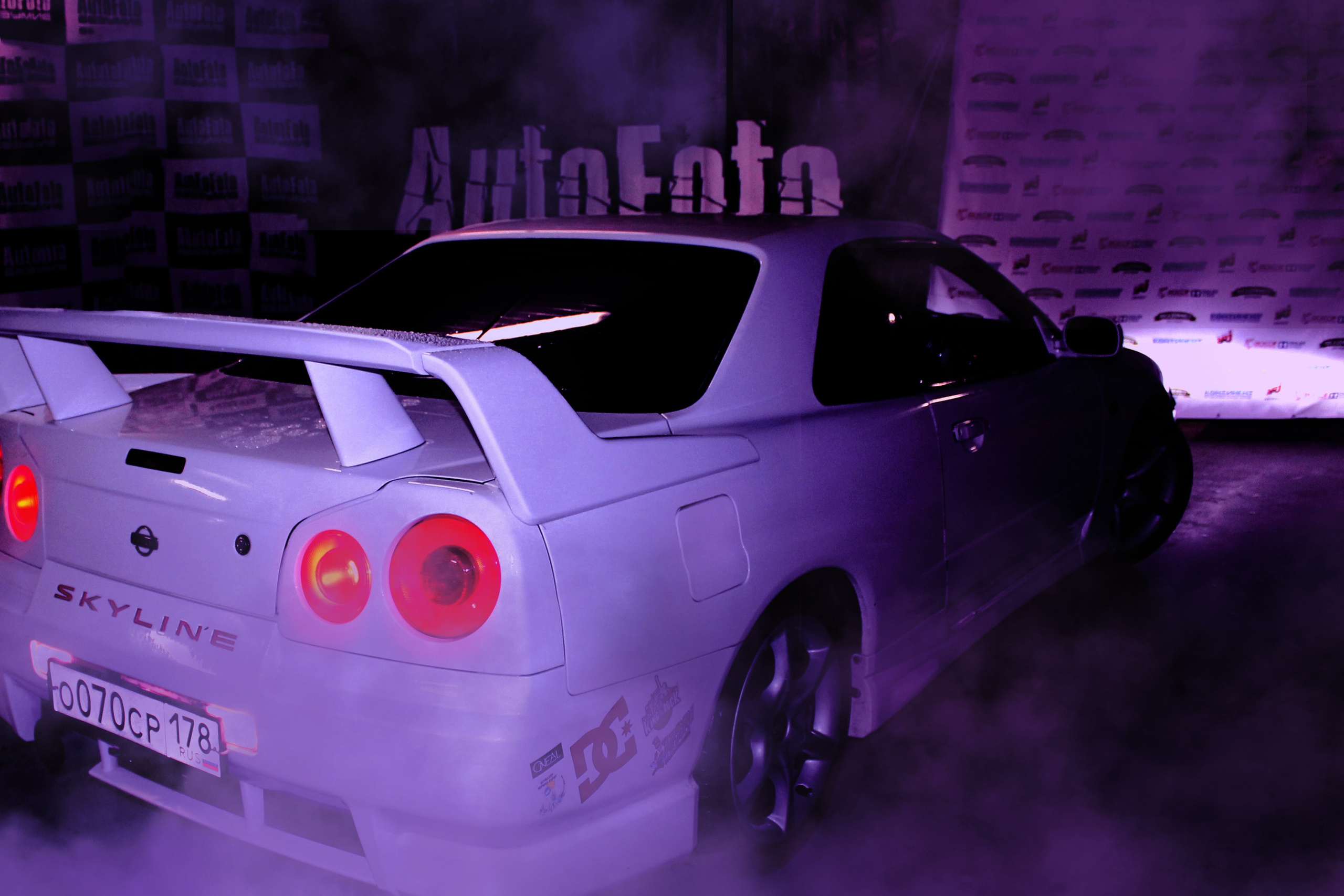 Commercial photo of a Nissan Skyline sports car on display at an exhibition