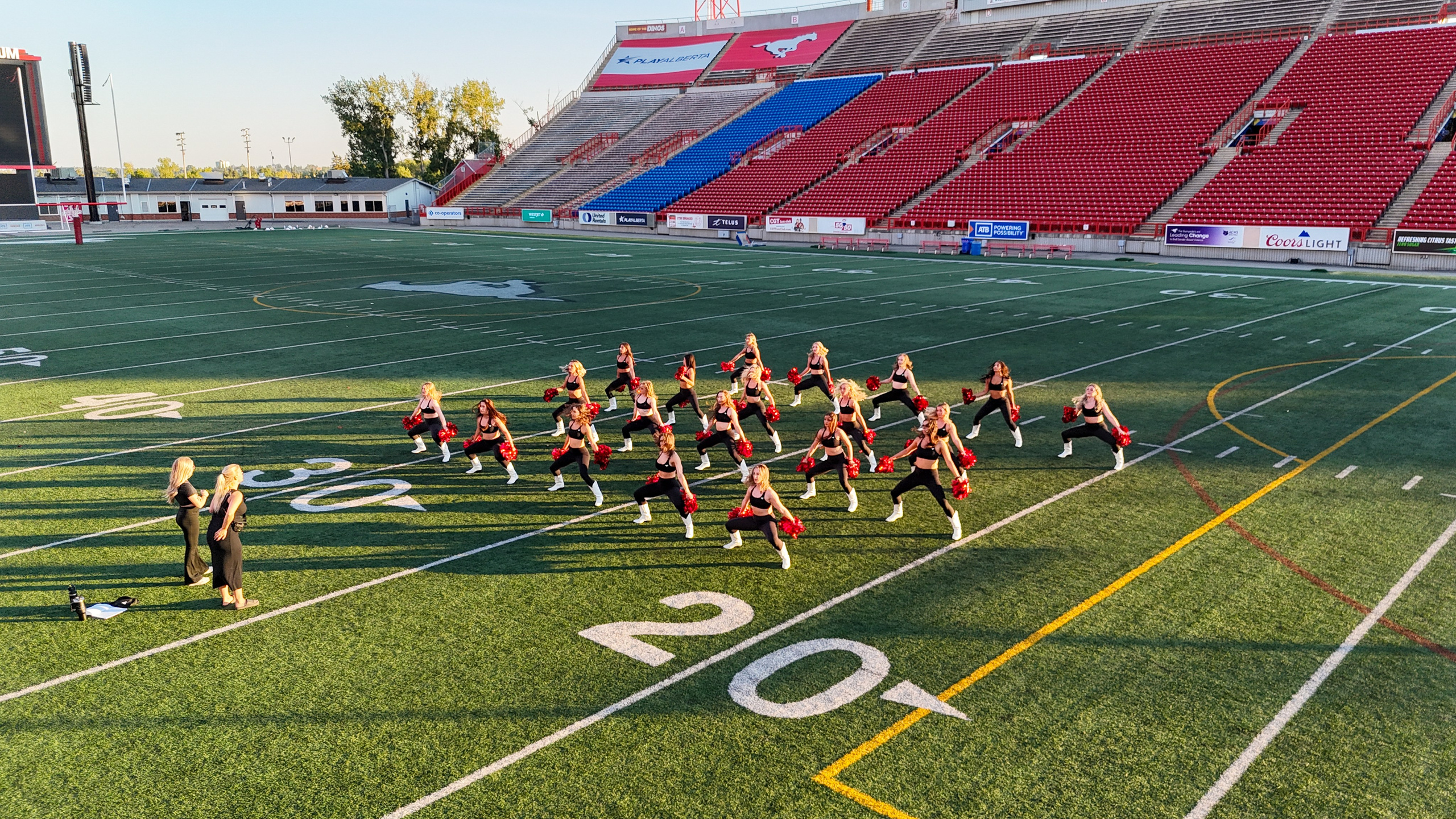 High Energy & High Kicks: The Calgary Stampeders Outriders in Action!. ProFly.club — Professional aerial filming in Calgary