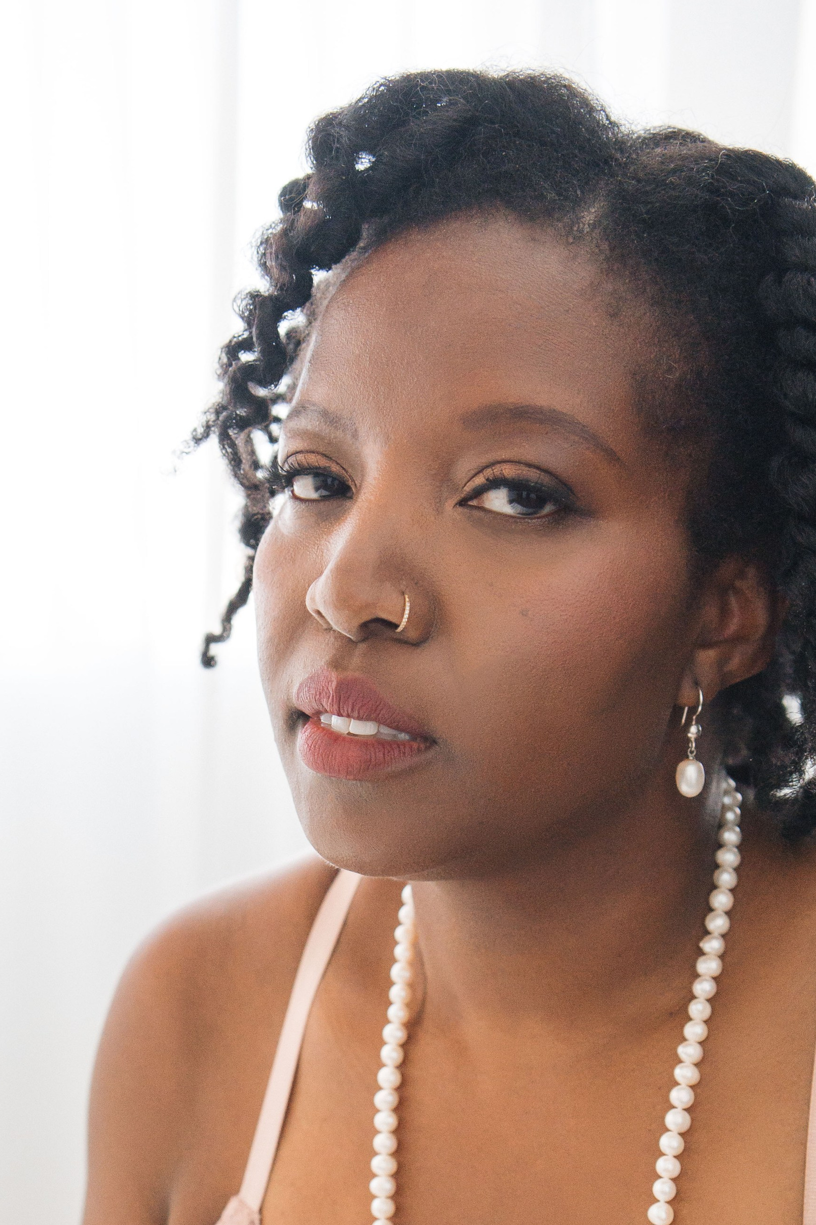 Couple dressed up and ready to go to Gatsby themed party 