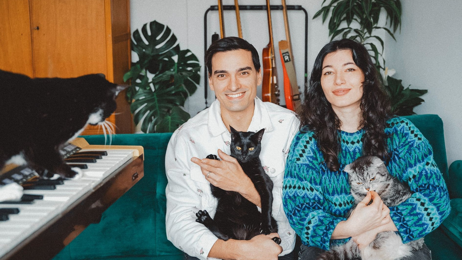 Jonny and Lilo, founders of Cat Café Records, with their rescue cats in Lisbon, Portugal