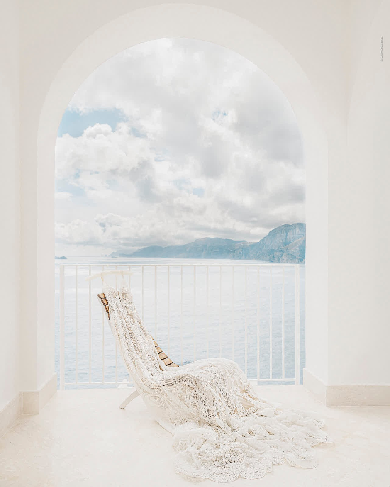 Luxury wedding photography in Italy: Ravello Amalfi coast amazing Bride dress photographer Mimmo De Nicolais, radiant light dances softly through a palette of pastel hues, painting the world in gentle whispers of color.