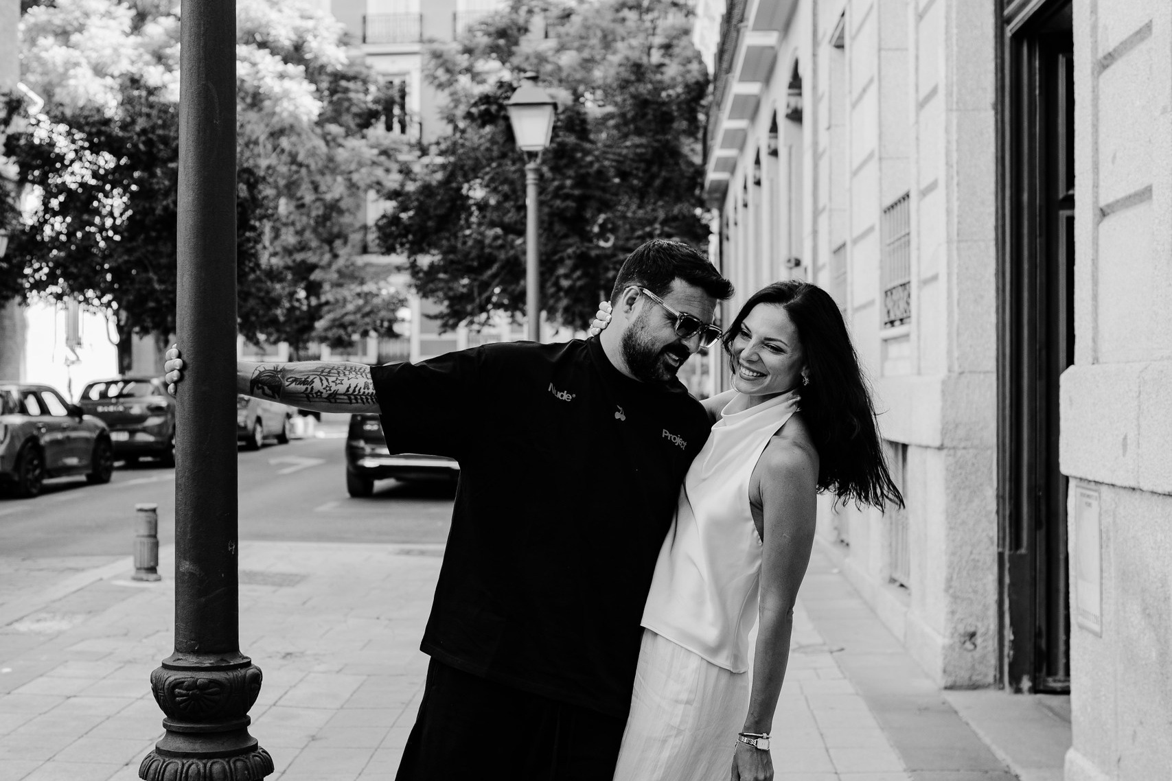 Romantic couple walking in the streets of Madrid.